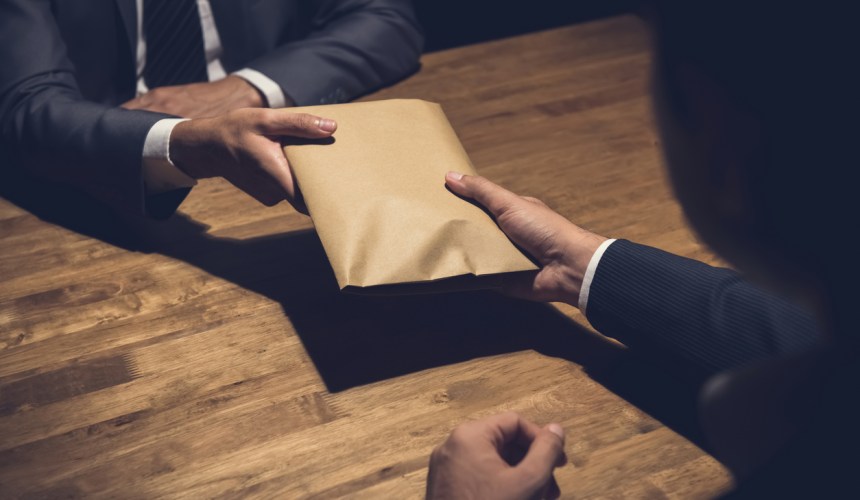 Two charged over alleged corrupt conduct
